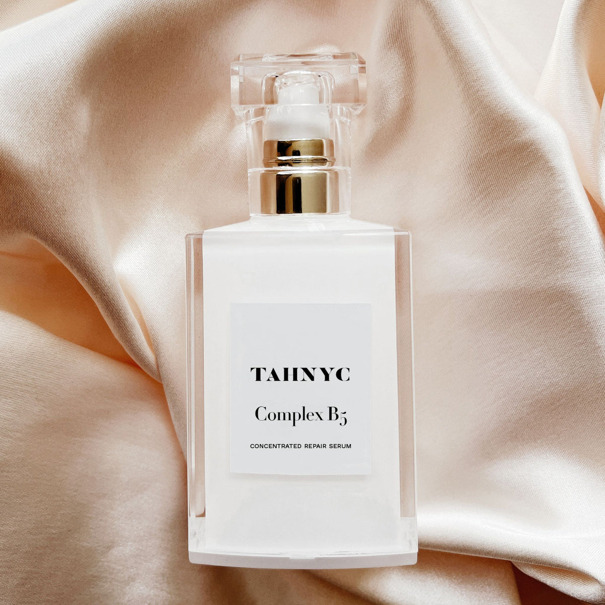 Tahnyc Complex B5 Concentrated Repair Serum against Silk backdrop | Canada