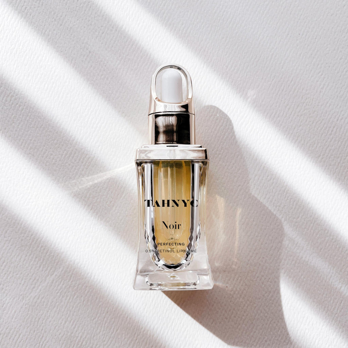 Tahync Noir Discovery Bottle Perfecting 0.5% Retinol Liposome on White Backdrop | Canada